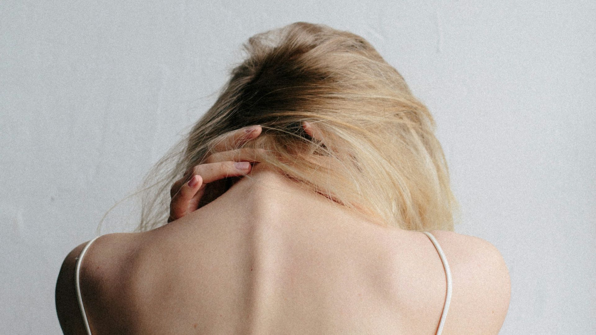 woman in white tank top