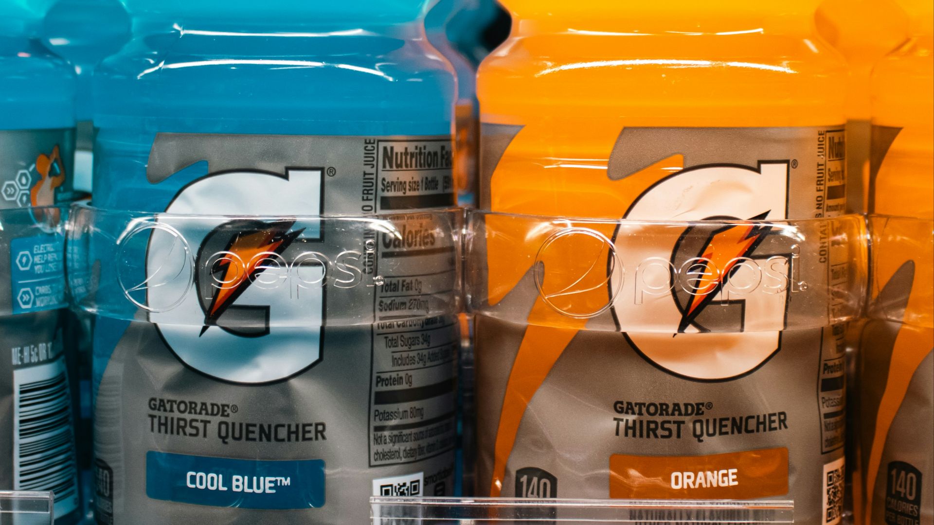 Gatorade bottles are displayed on a store shelf.
