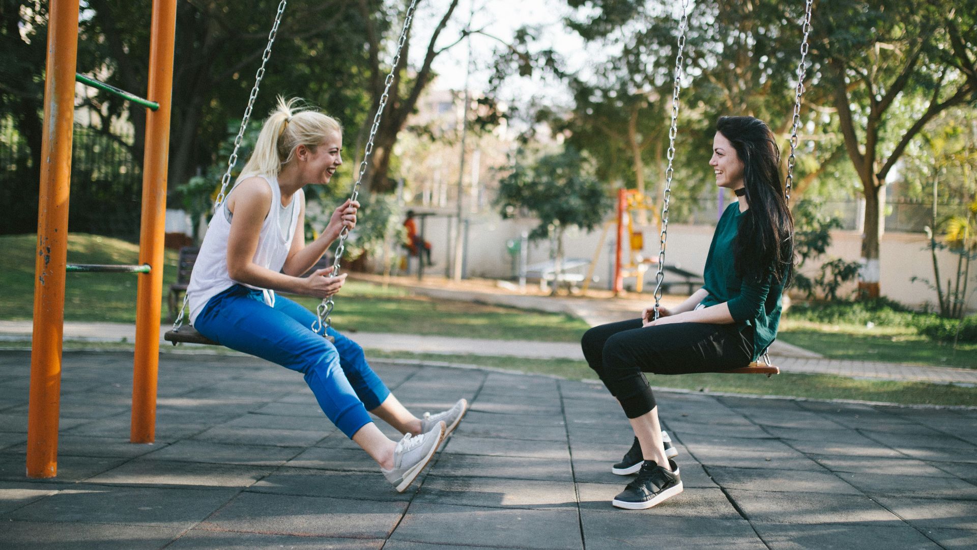 woman sitting on swing
