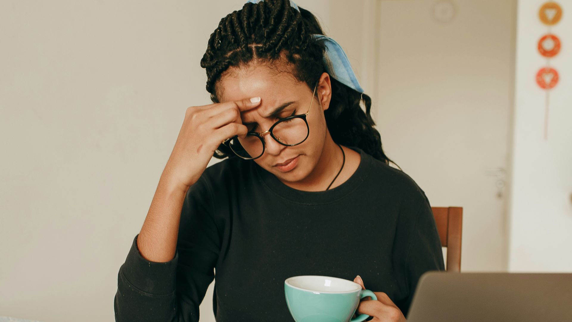 woman in black long sleeve shirt sitting on chair