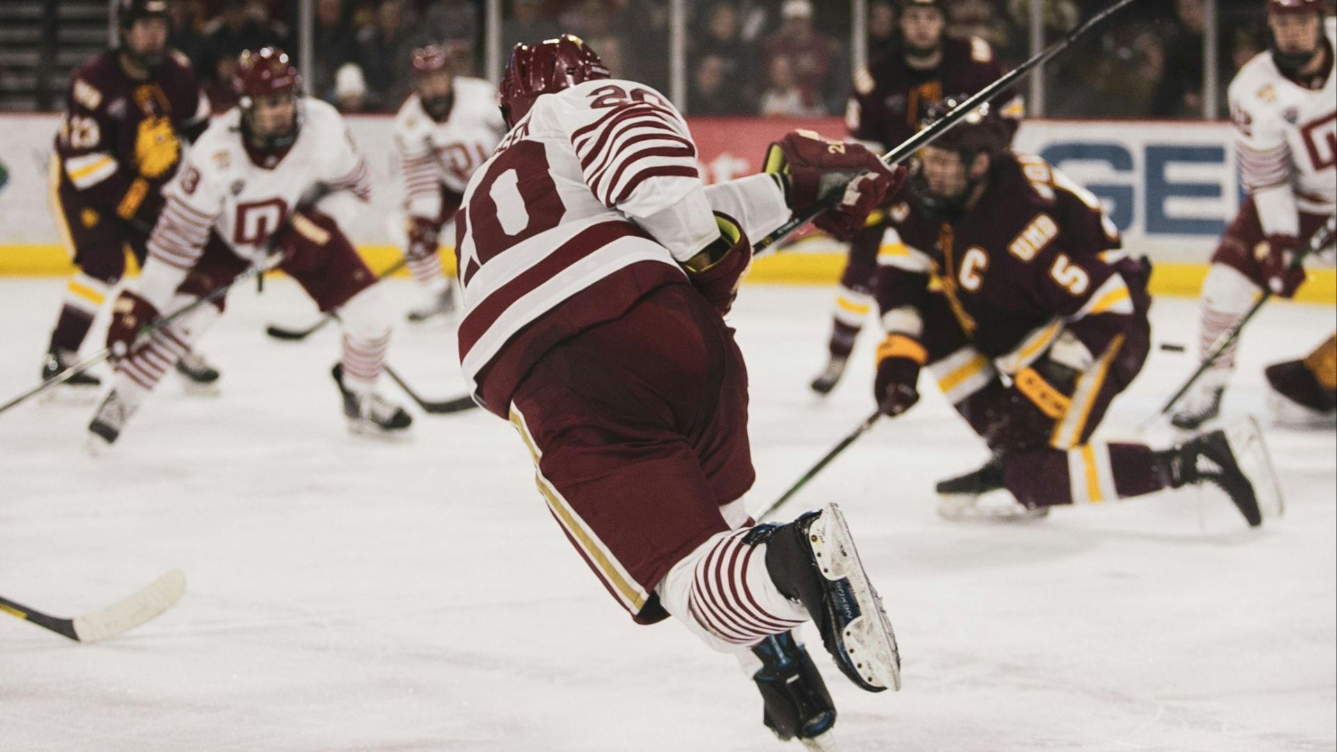 ice hockey players on ice hockey stadium