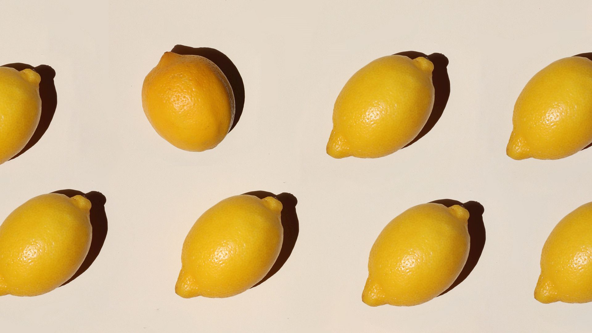 yellow fruit lot on white surface