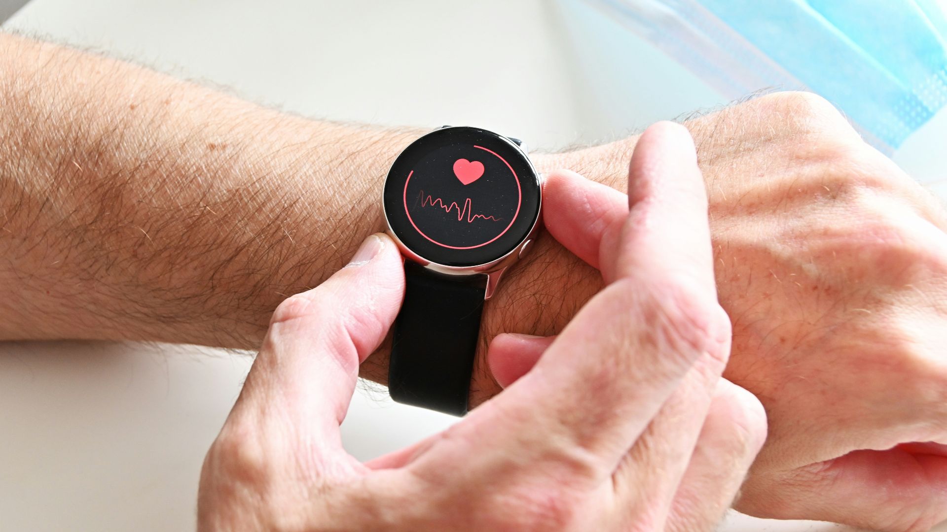 a person holding a stopwatch