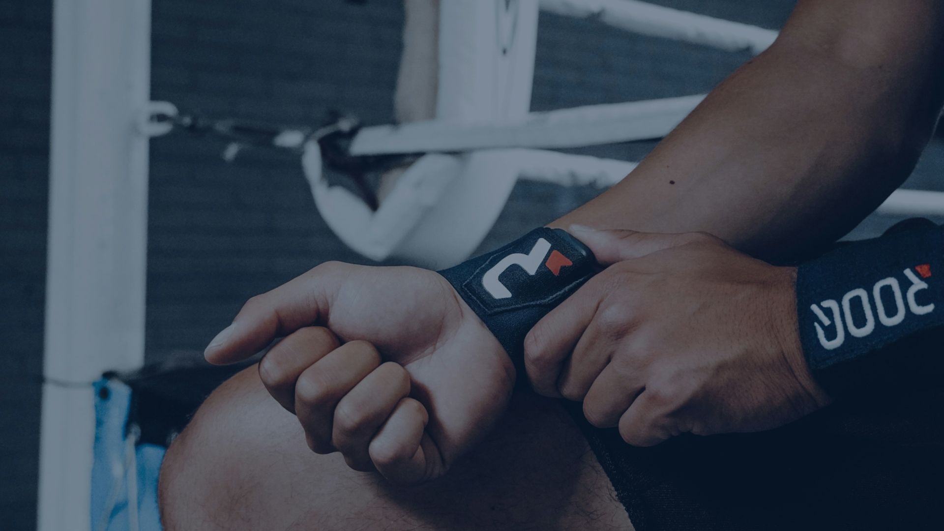 person holding black and orange digital device