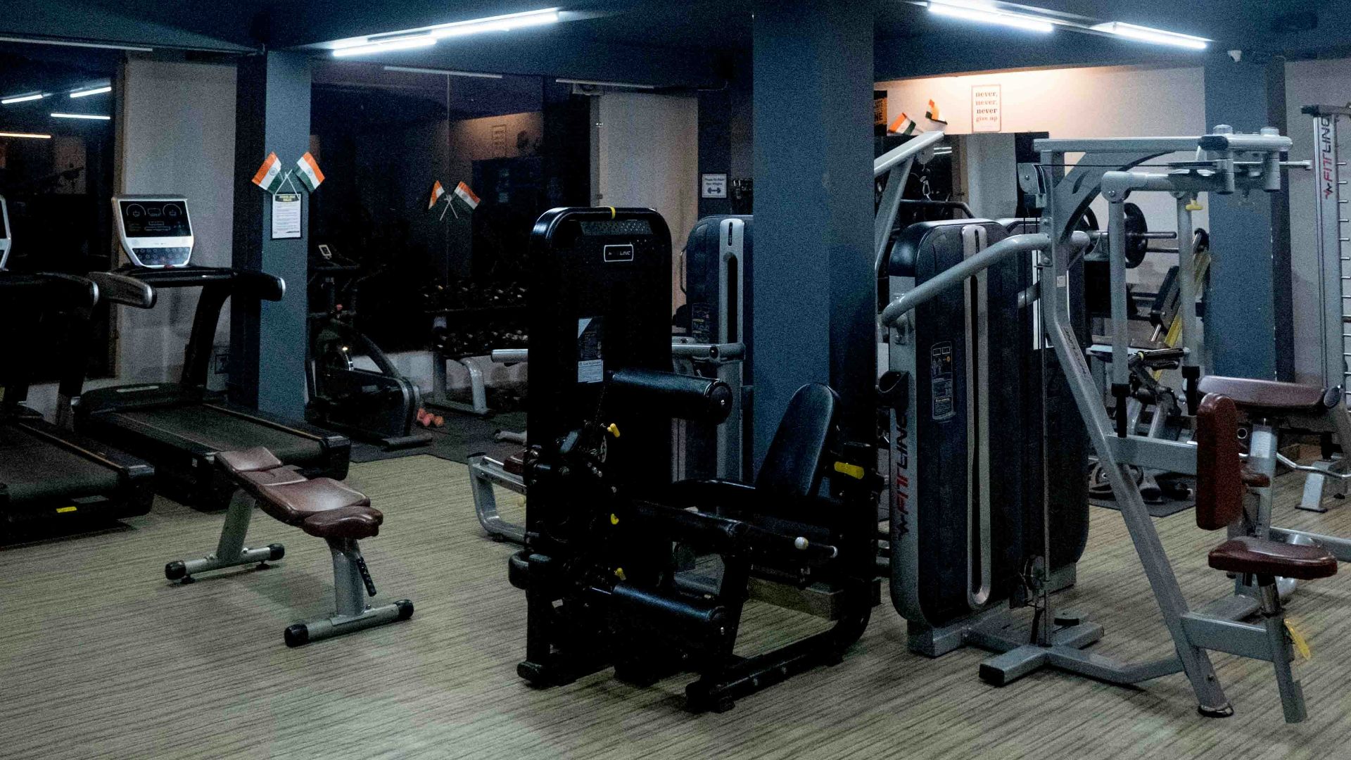 a gym with a lot of equipment in it