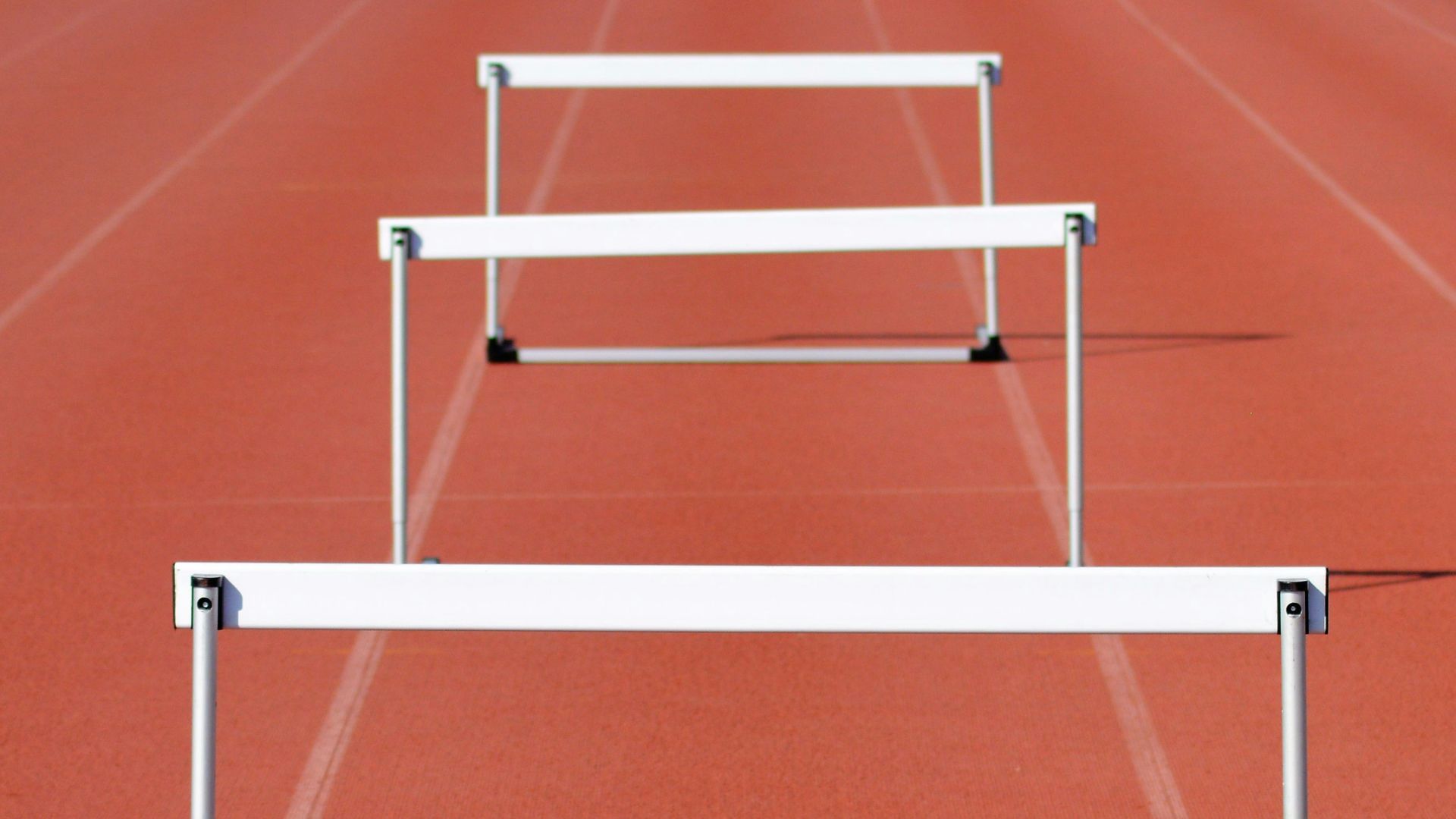 white track field with white ramsp