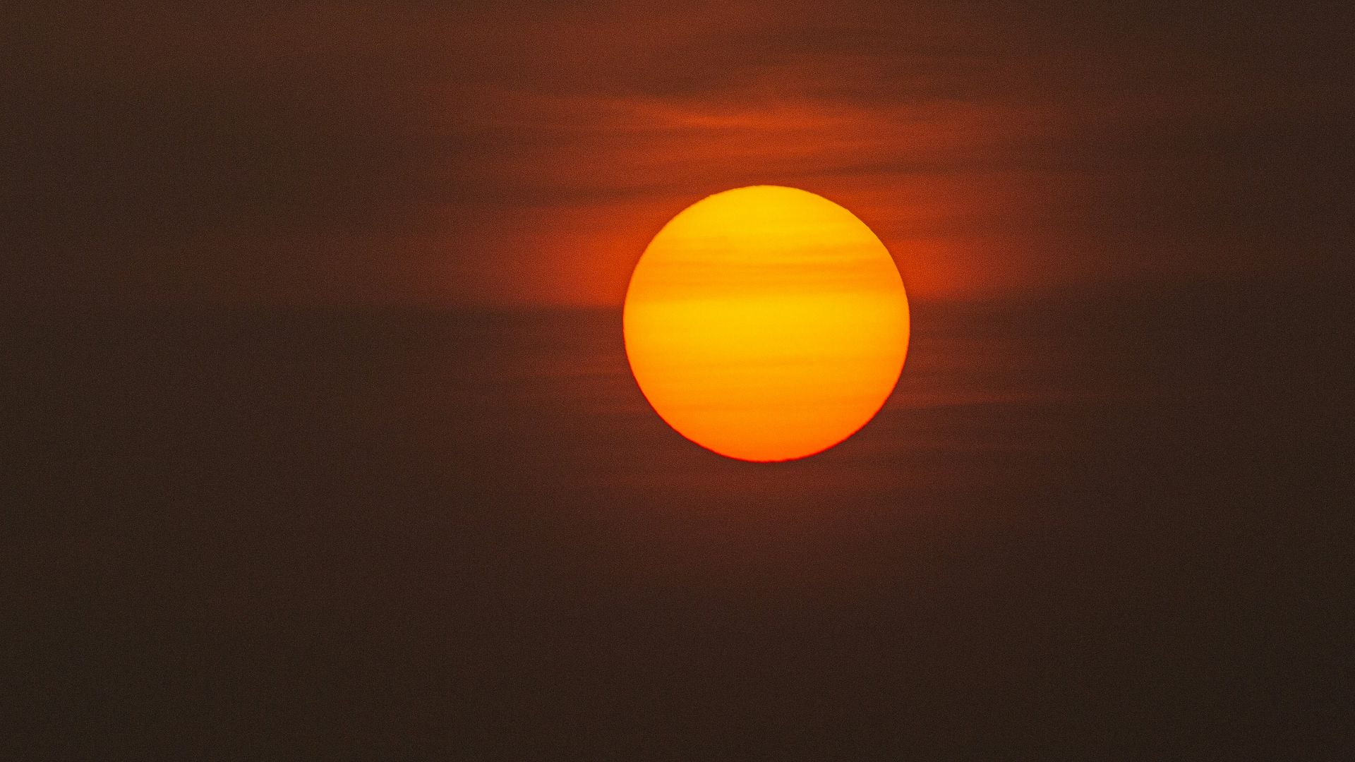 low-light photo of sun
