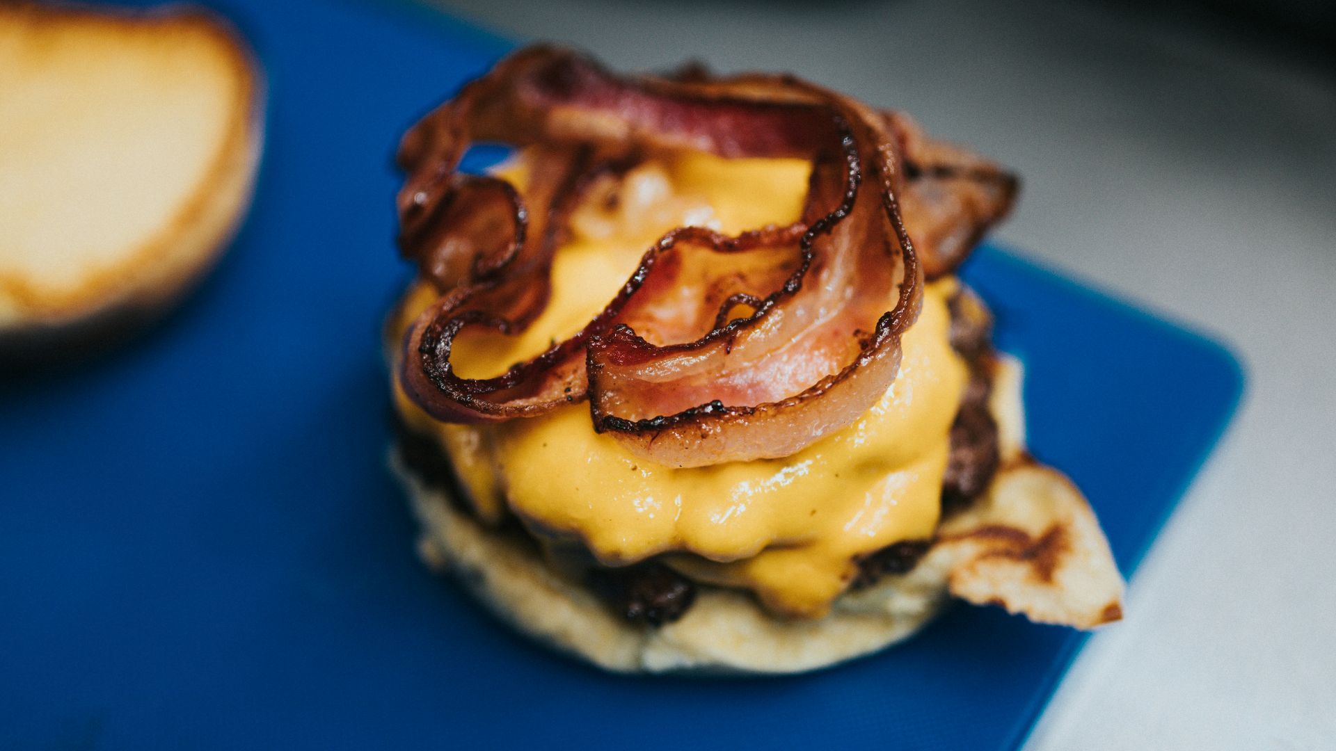 brown and white pastry on blue textile