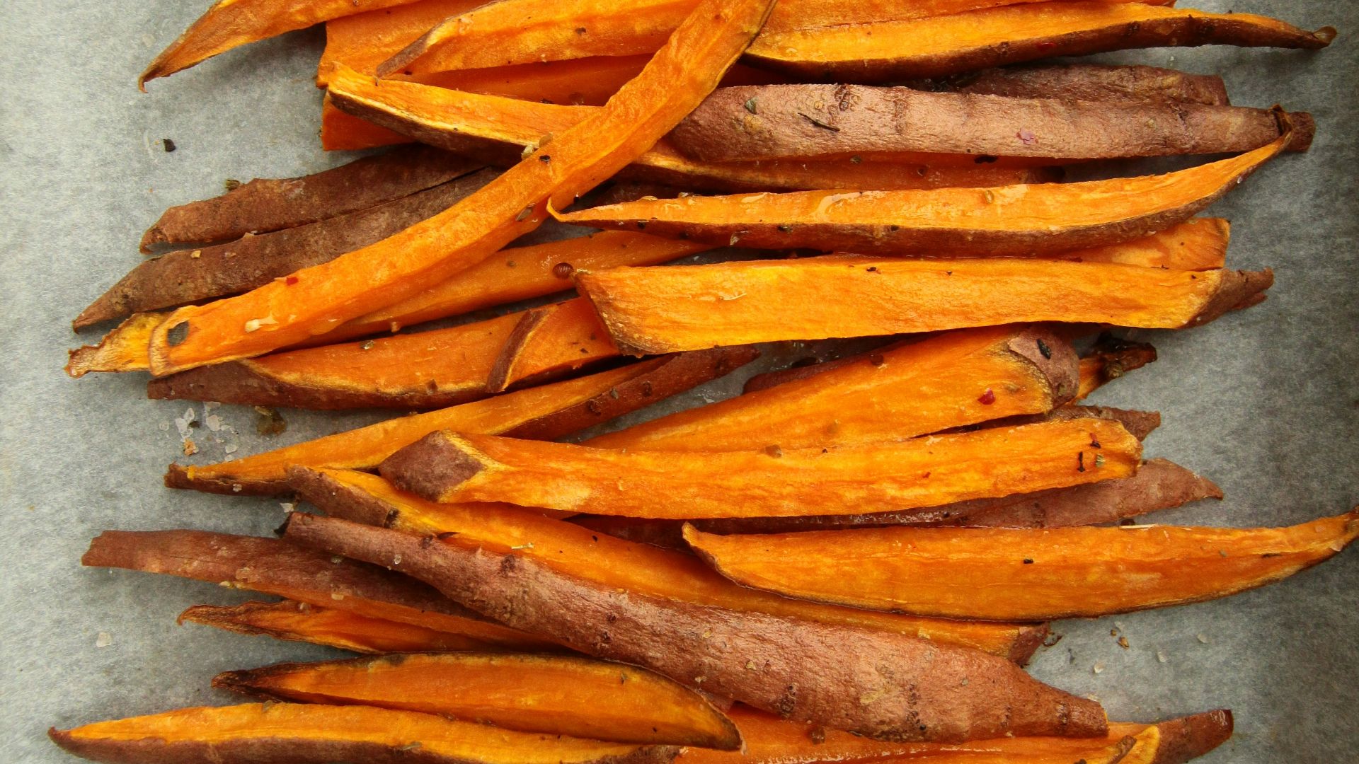 sliced carrots on gray surface