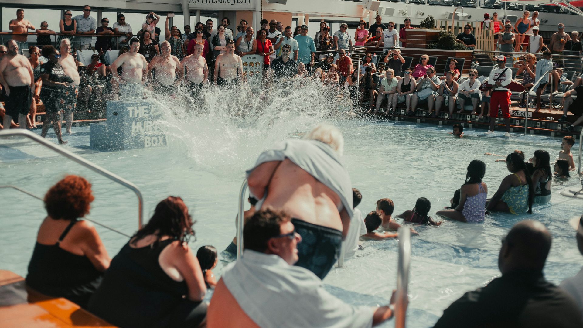 people in the swimming pool during daytime