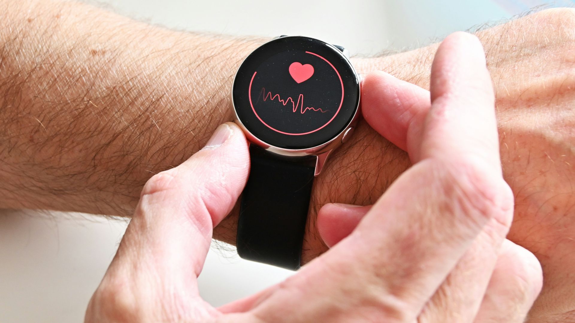 a person holding a stopwatch