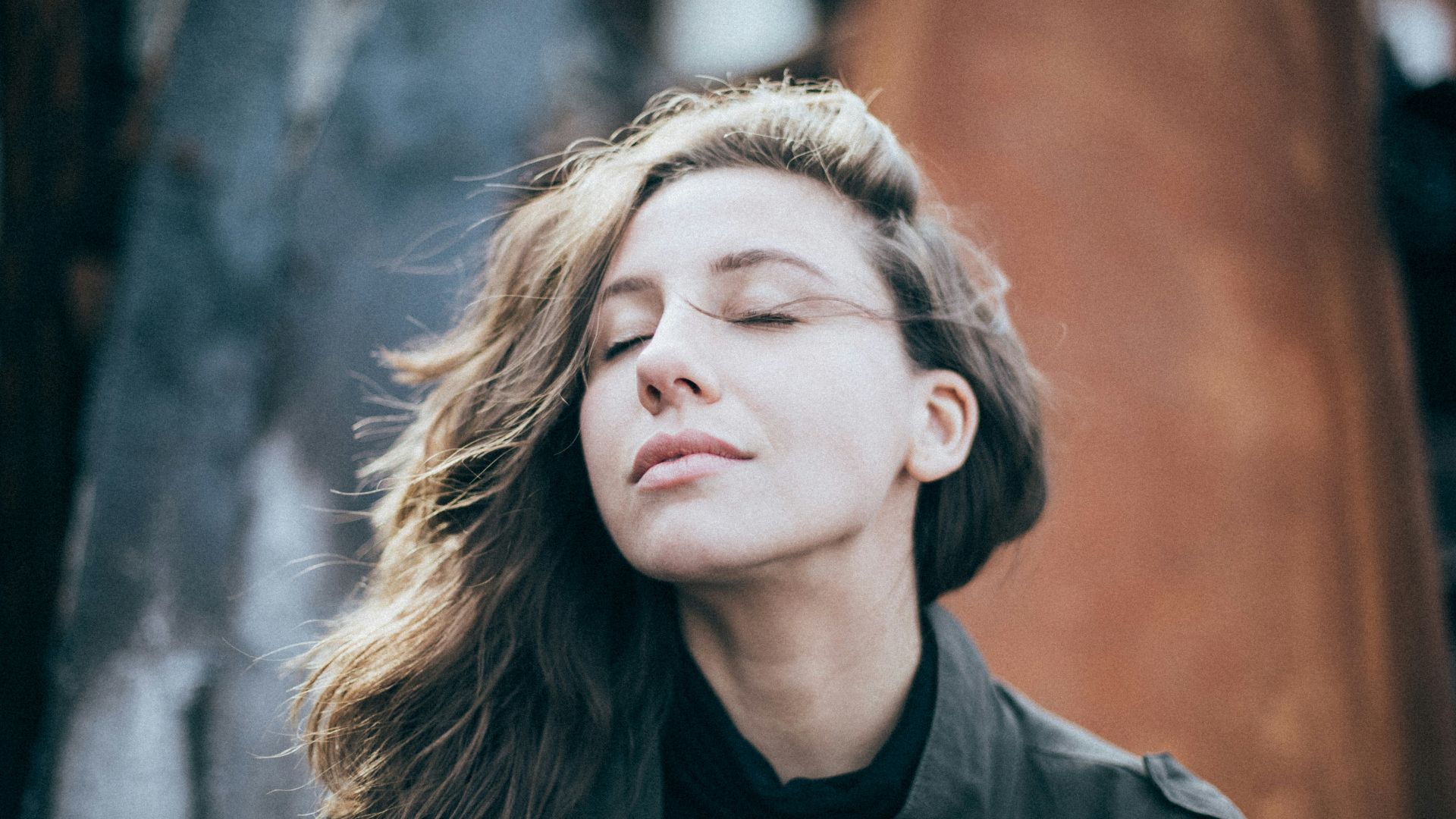 closeup photo of woman wearing black top