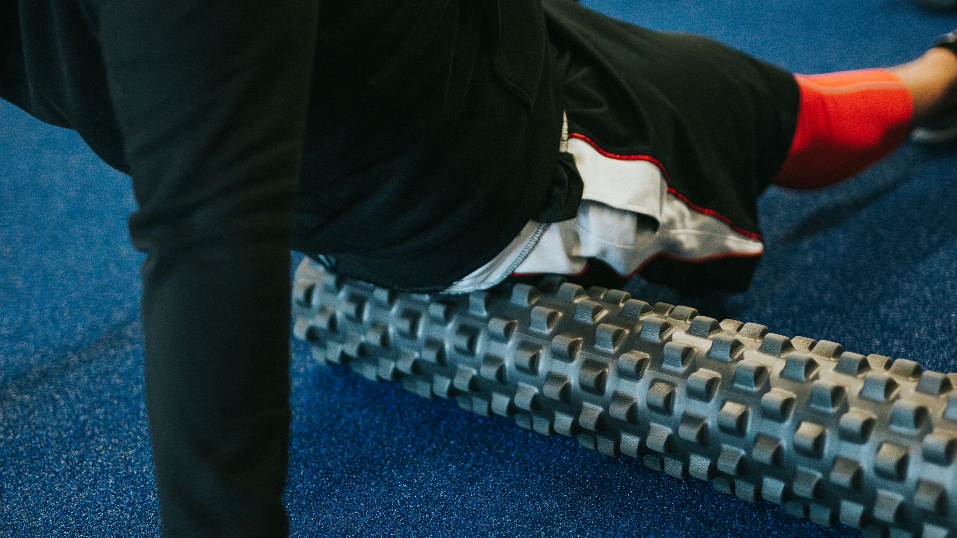 person in black pants and white shirt