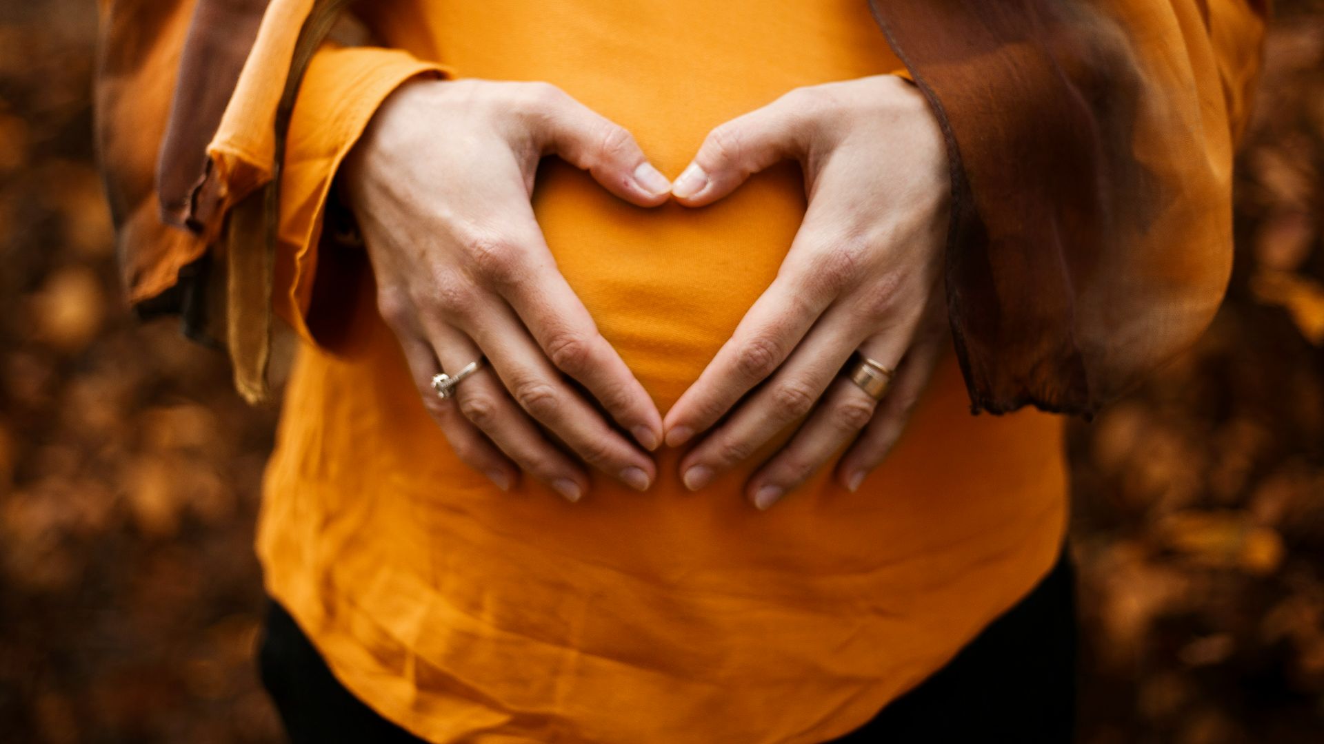 person touching stomach