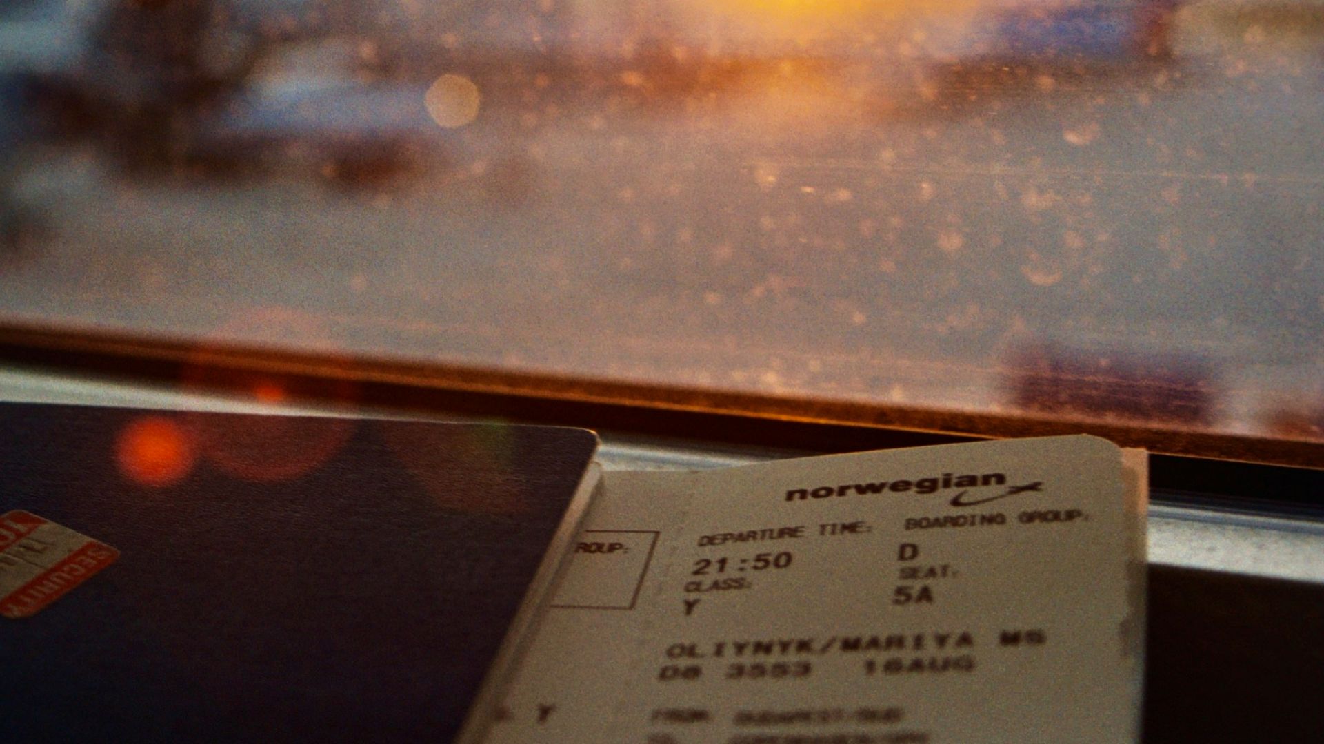 white printer paper on glass window during sunset