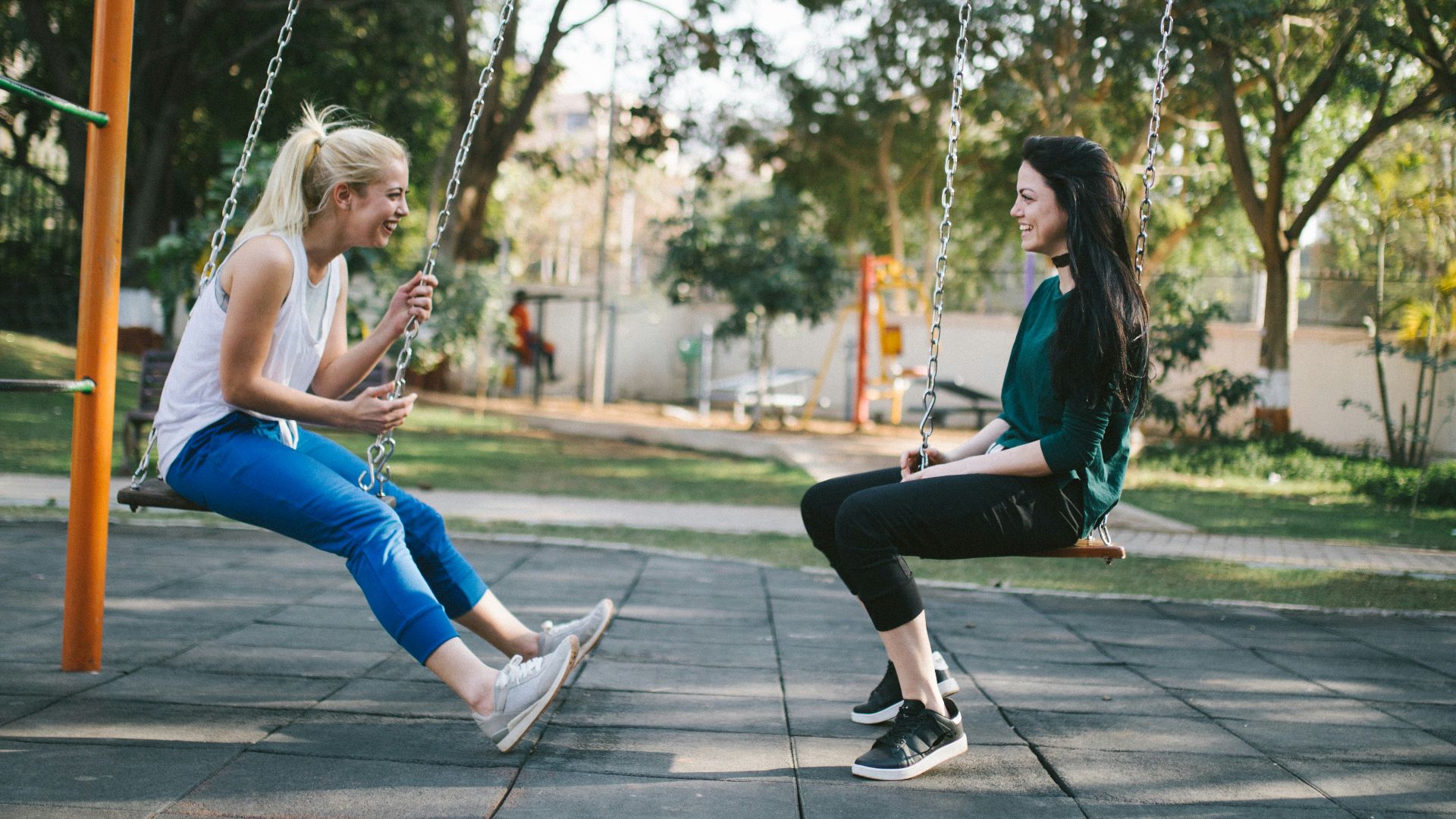 woman sitting on swing