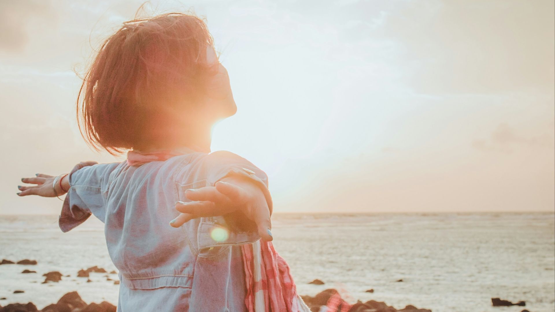 woman spreading her arms