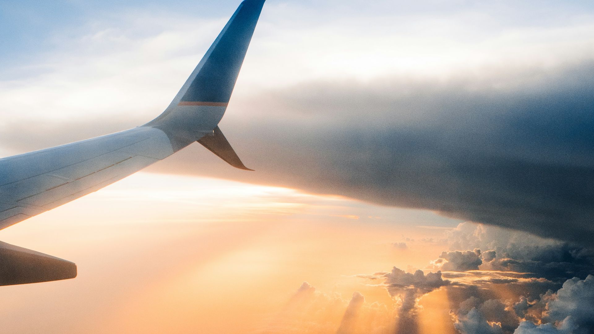 airplane on sky during golden hour