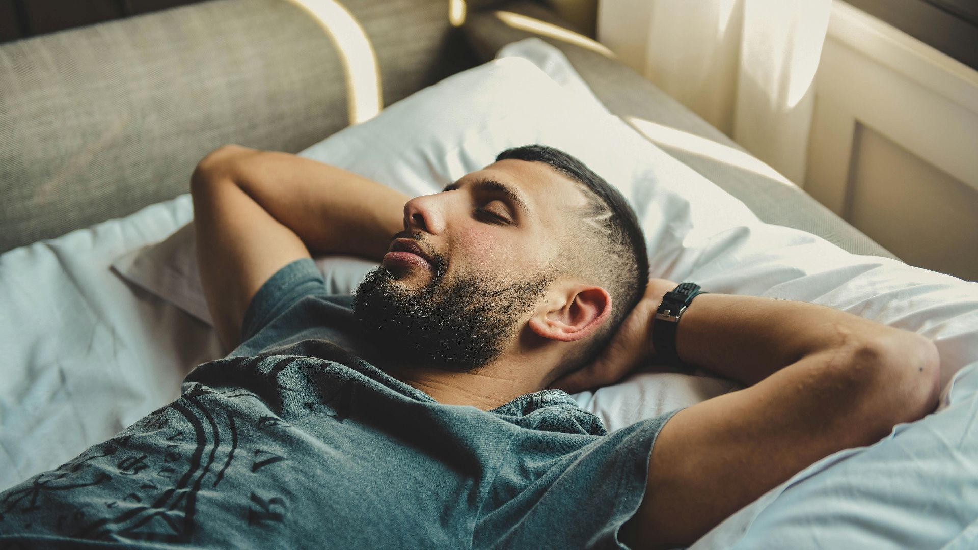 man lying on bed