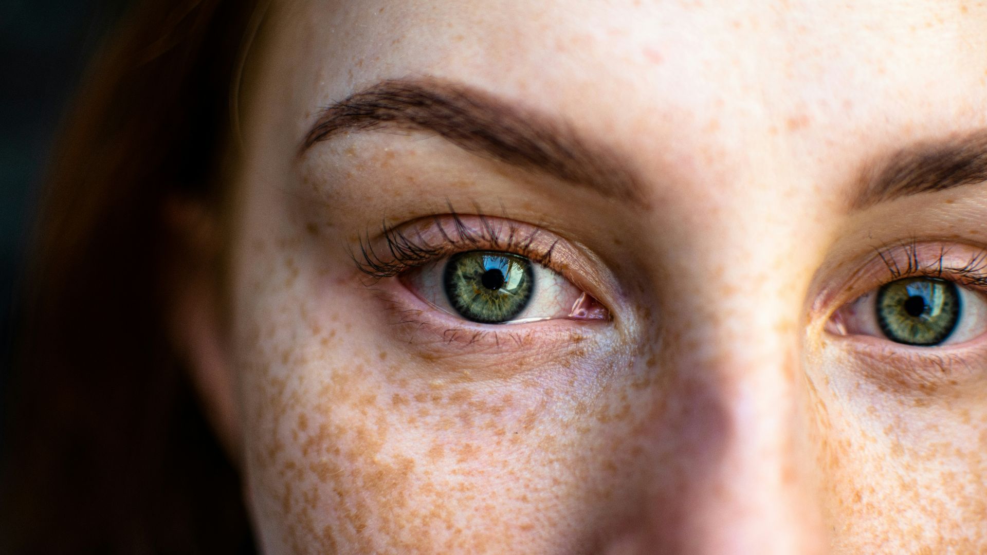 persons eye in close up photography