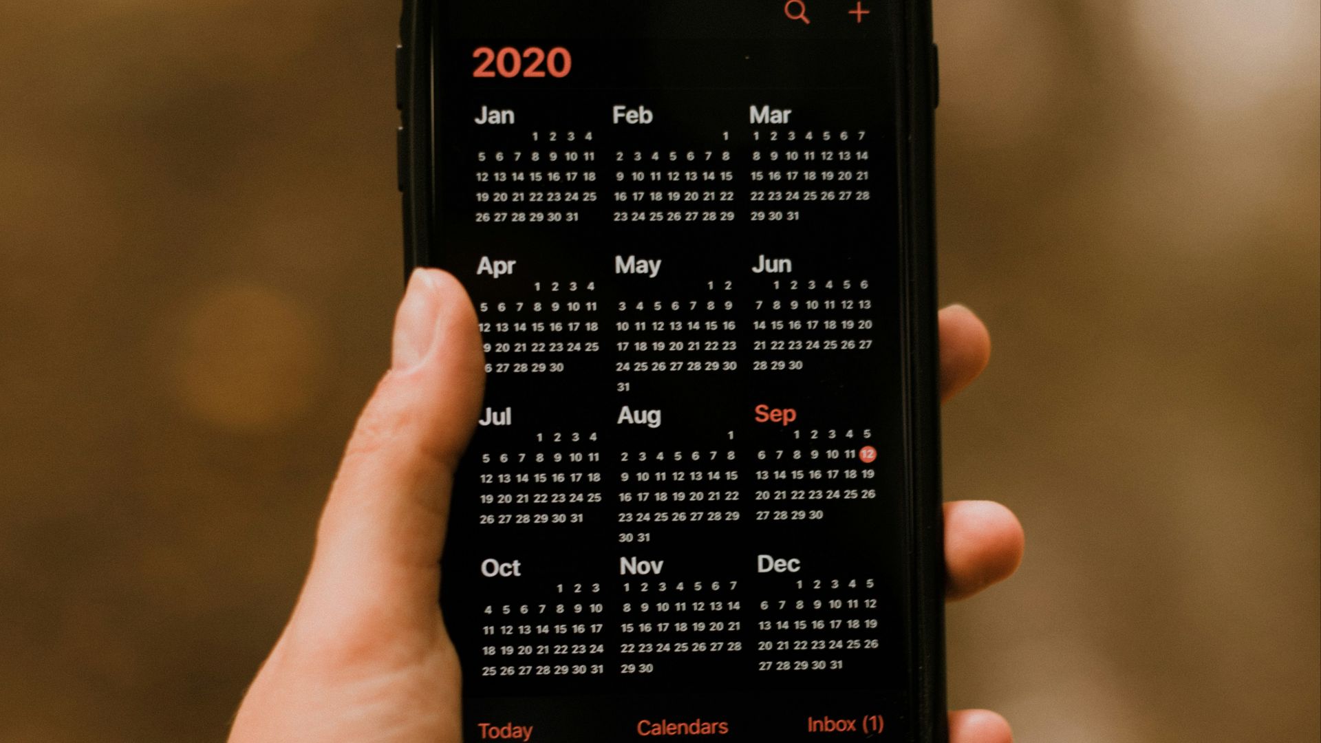 person holding black android smartphone