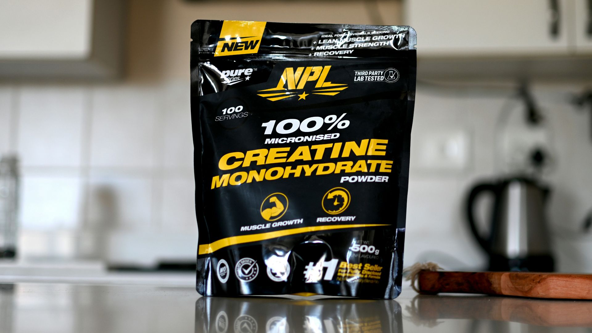 A bag of creatine monohydrate sitting on a counter