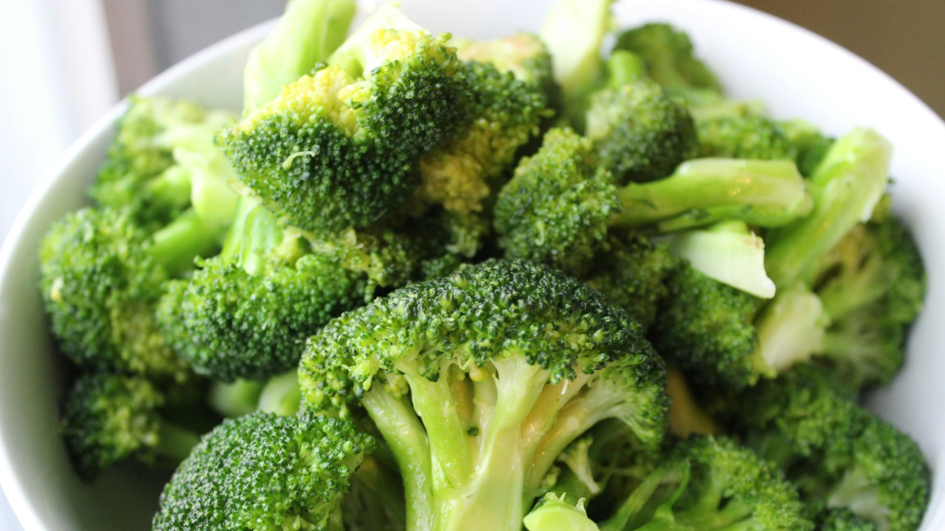 green broccoli on white ceramic plate