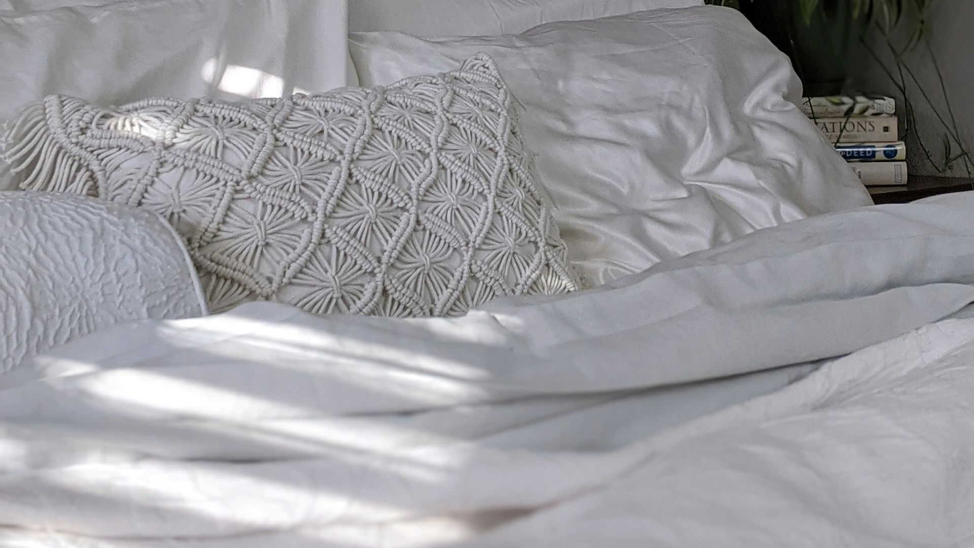 white and gray bed linen