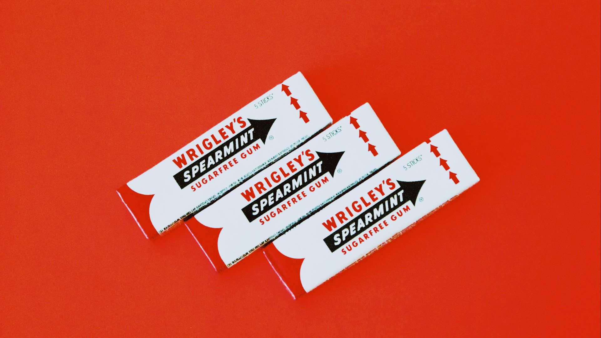 three Wrigley's spearmint gum packs