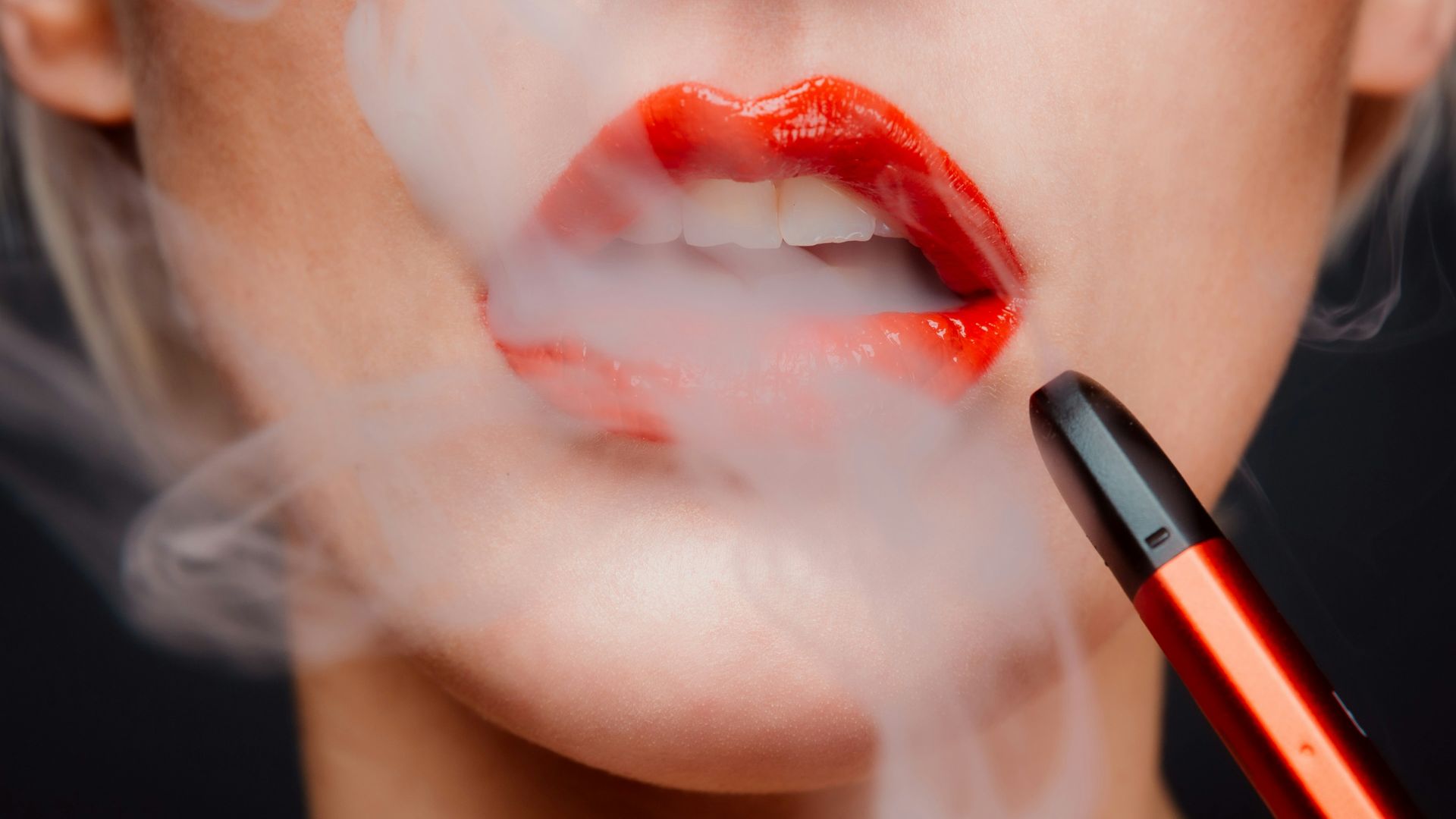 woman with red lipstick and red lipstick