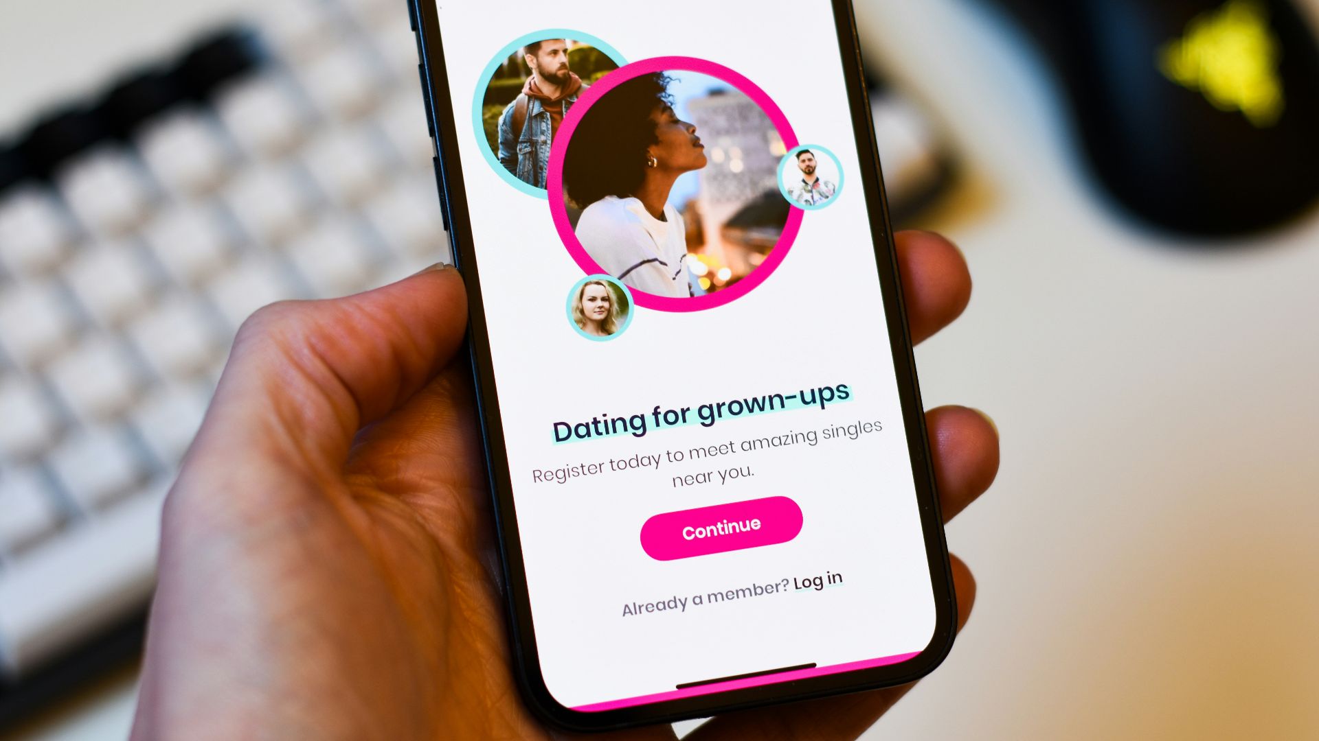 a person holding a cell phone in their hand