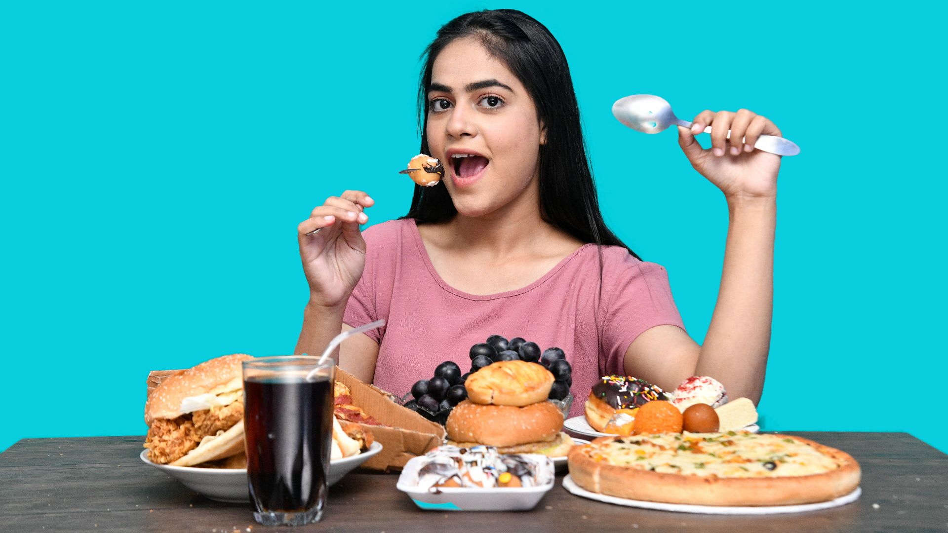 a woman eating a sandwich