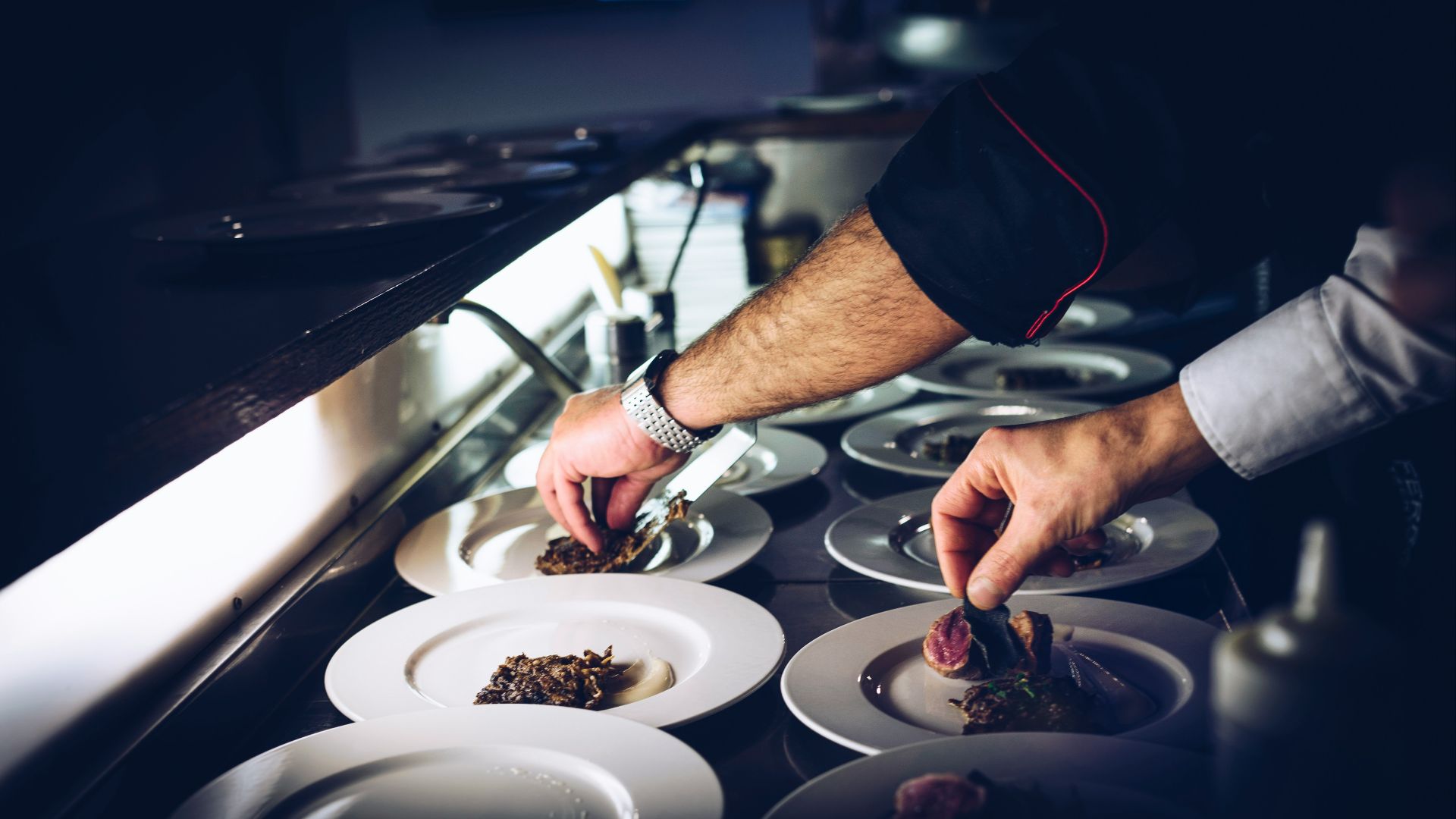 person preparing cooked dish