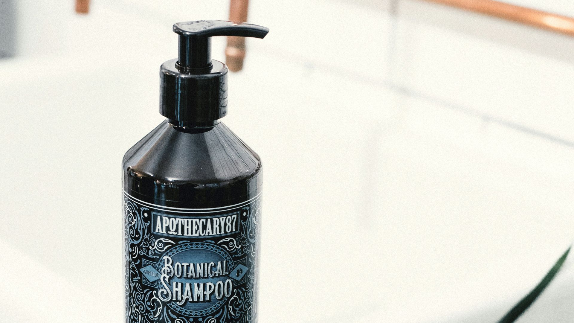 black and white plastic pump bottle