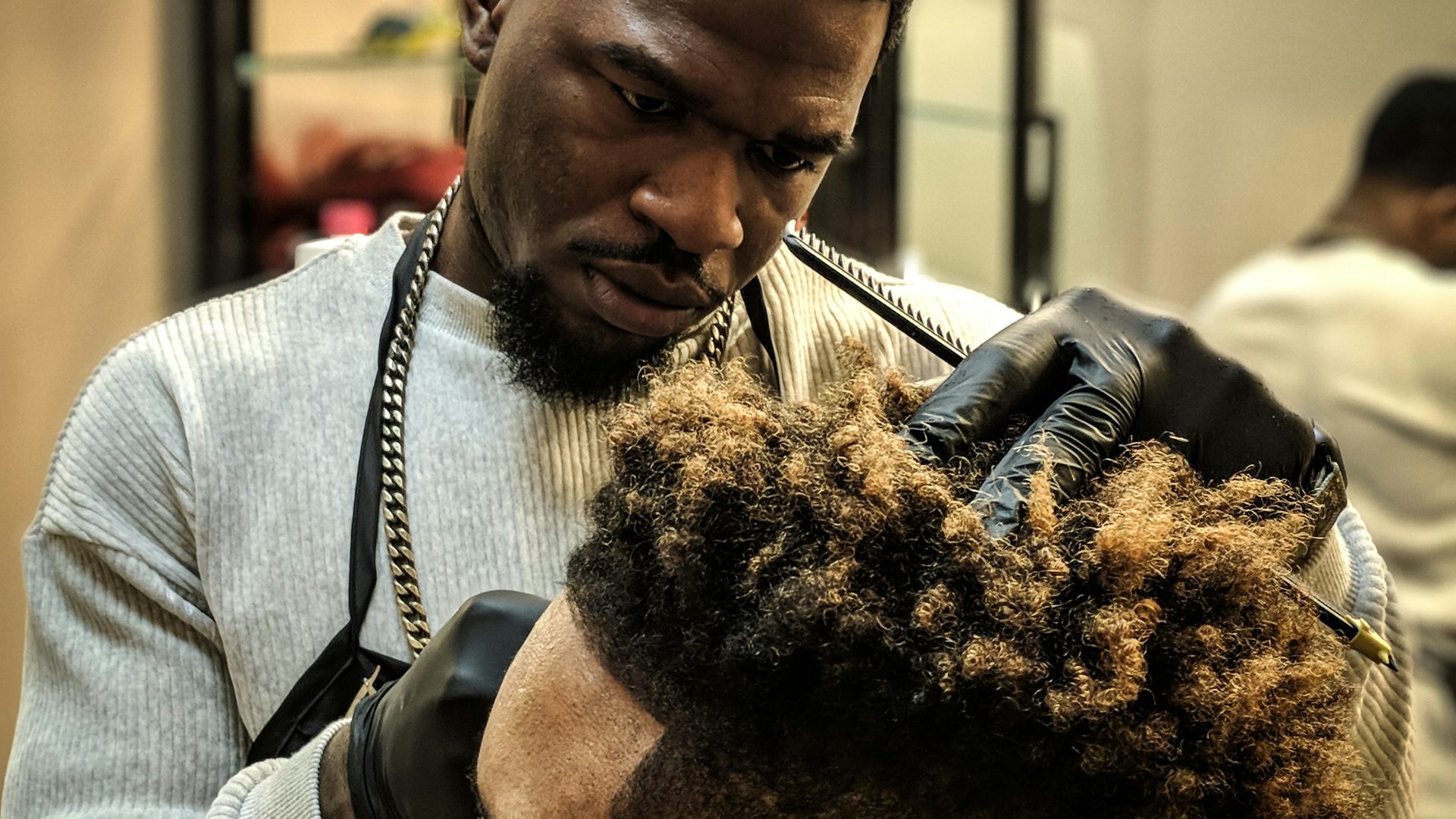 man cutting hair man