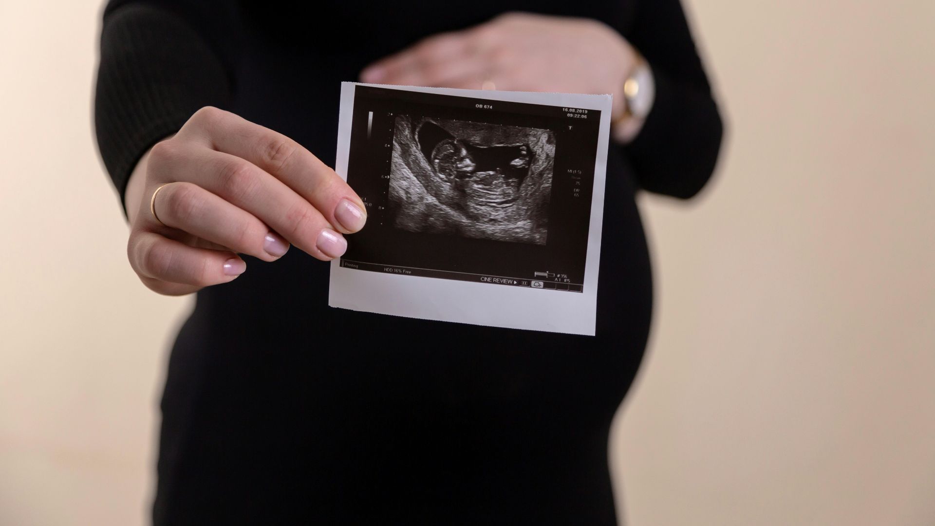 a person holding a tablet
