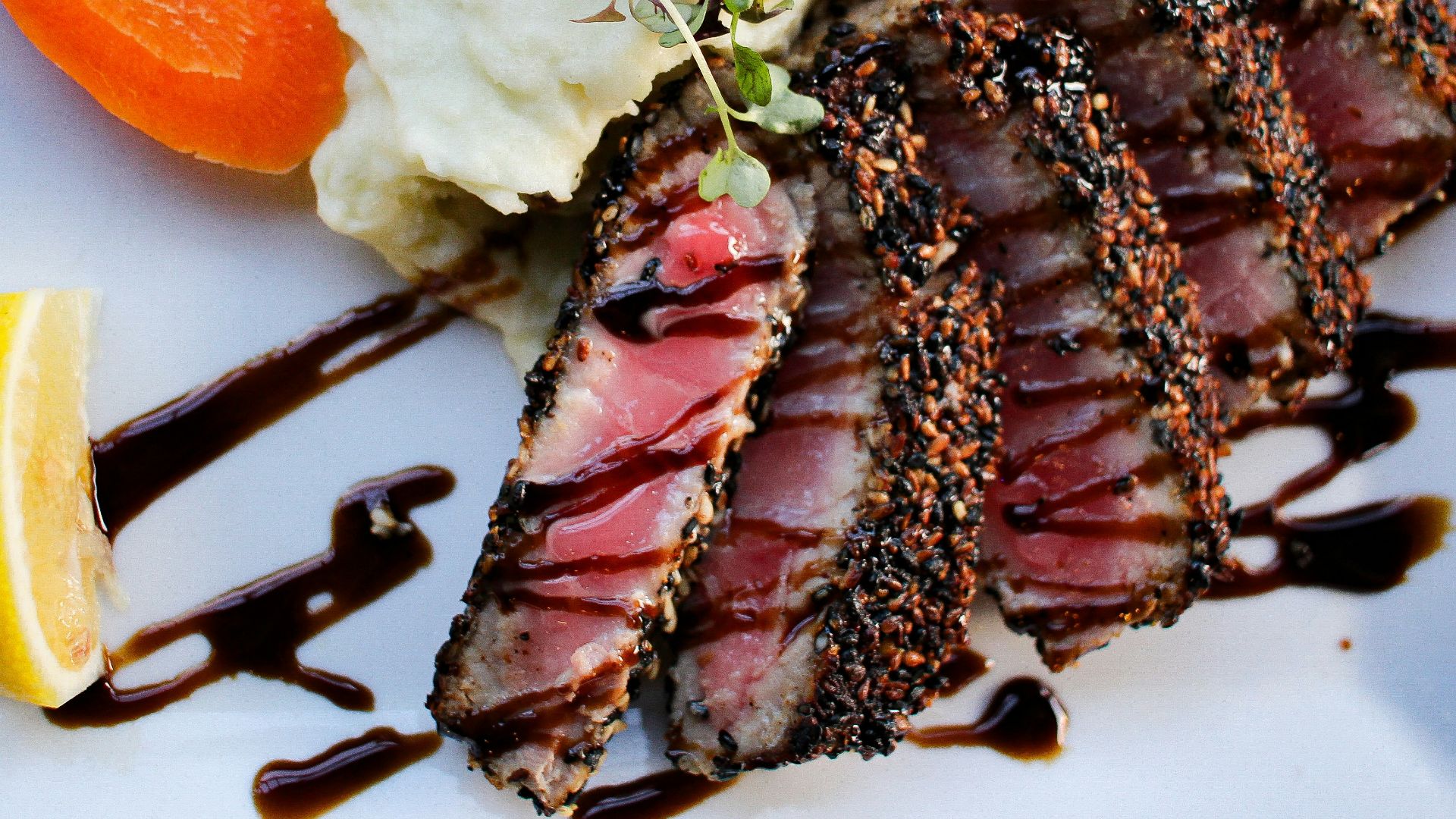 cooked food with sliced carrots and green vegetable