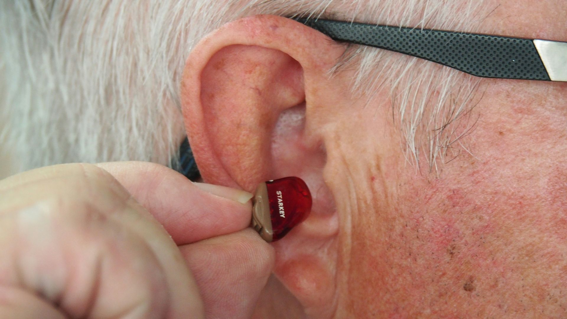 person wearing black framed eyeglasses