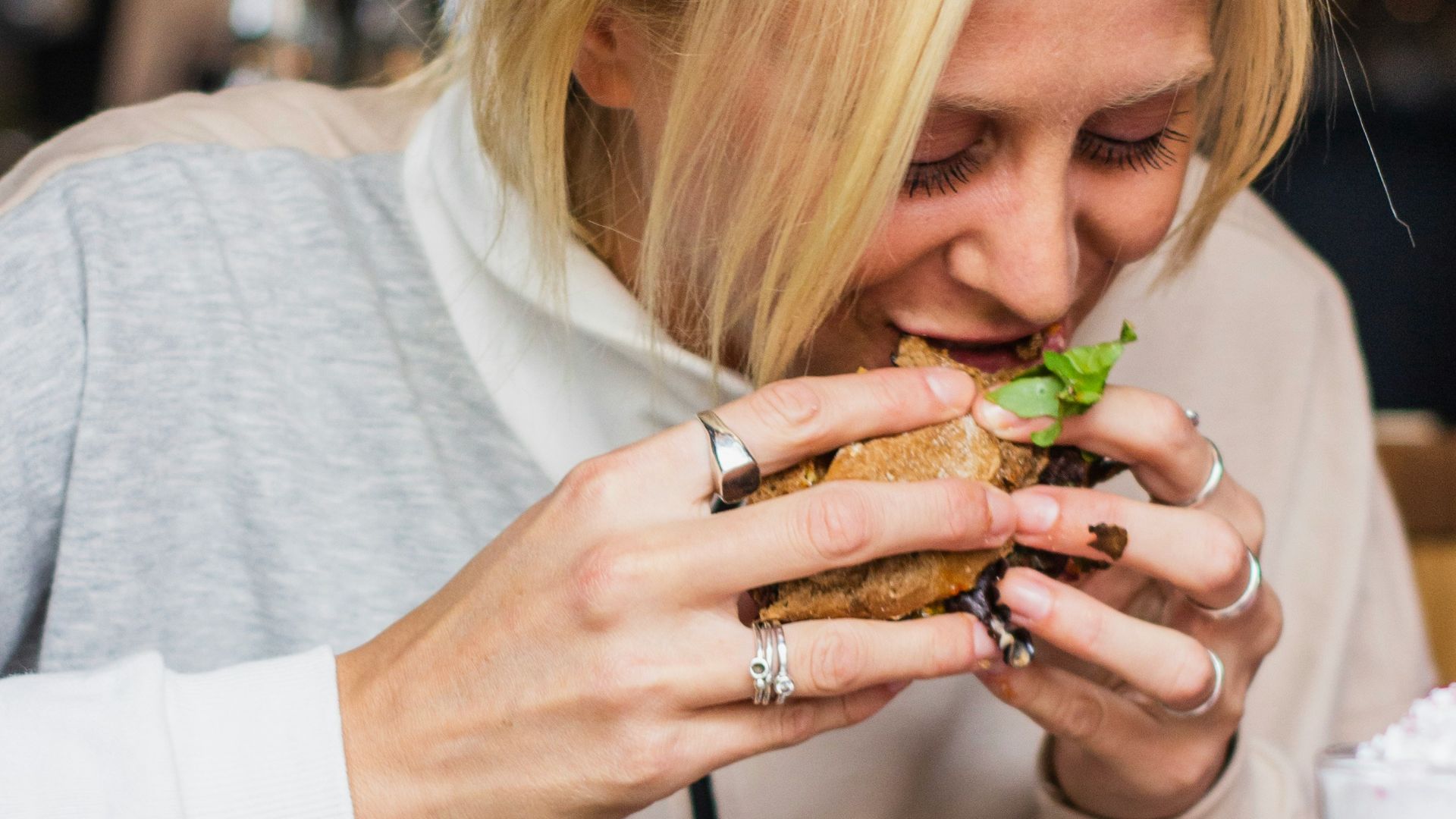 woman eating burger
