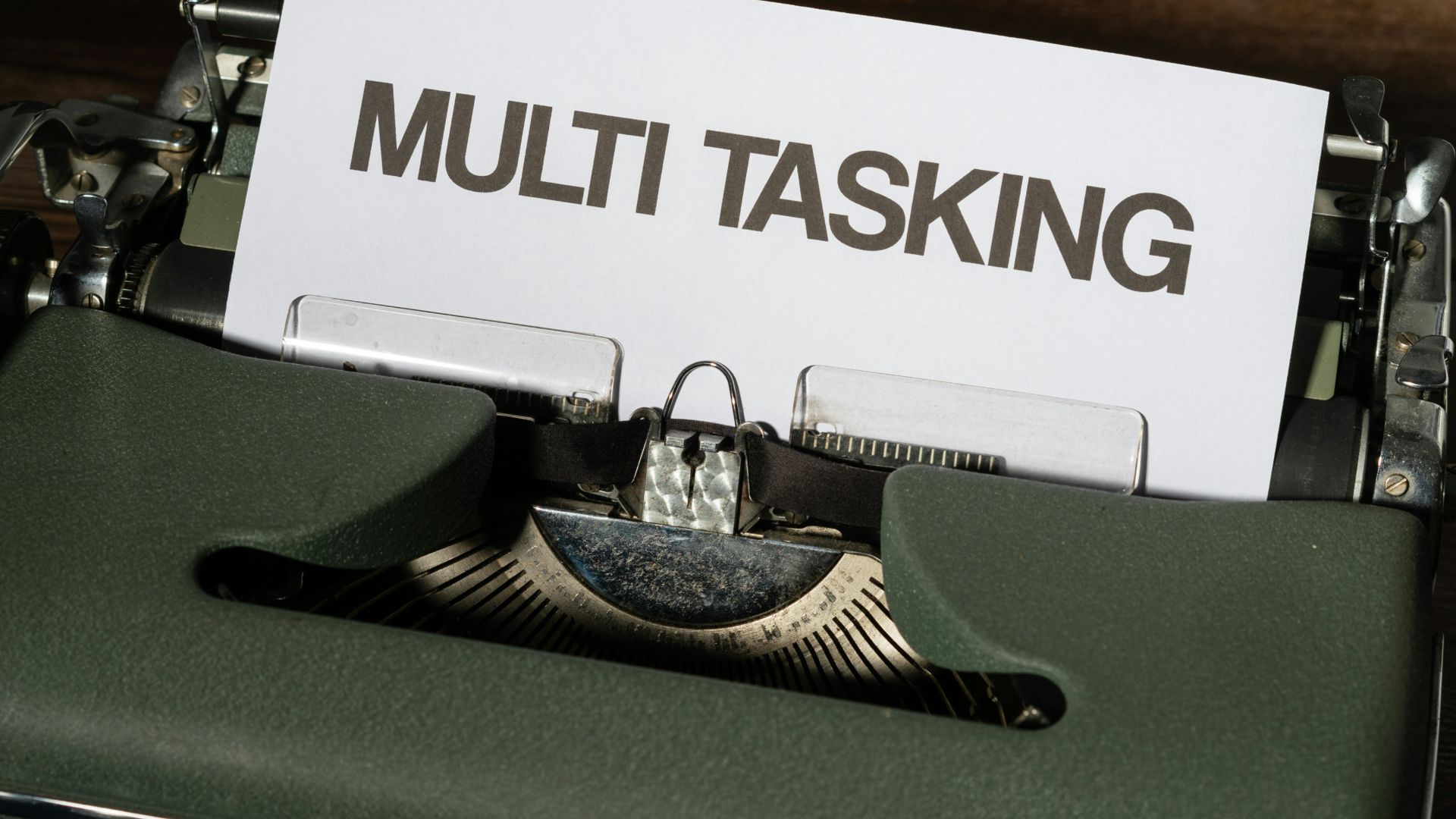 a close up of a typewriter with a paper on it