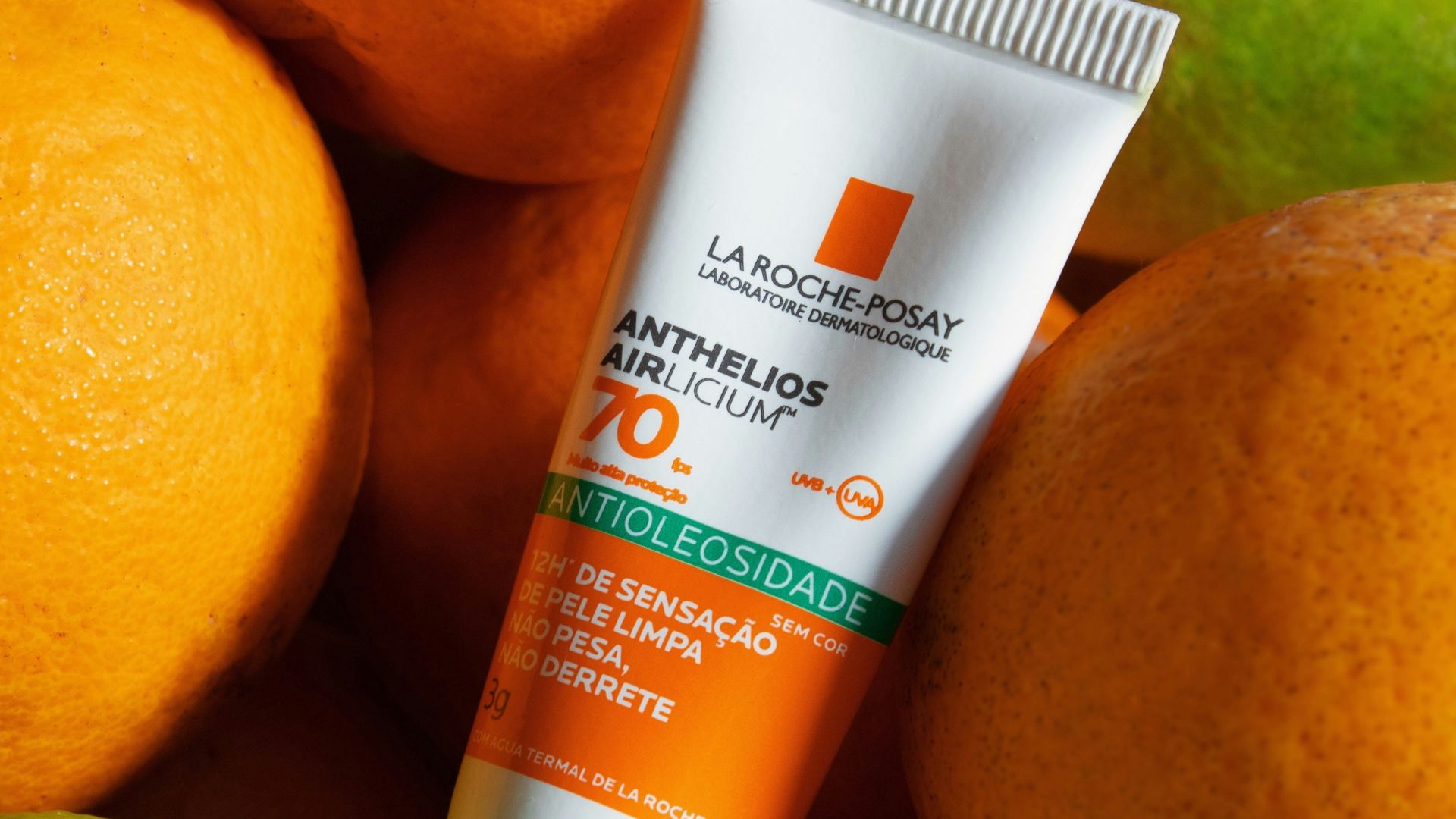 orange and white tube bottle