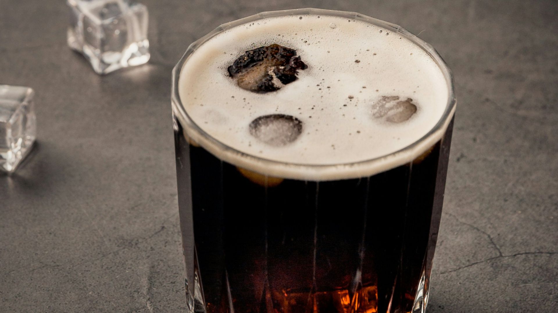 clear glass cup with beverage