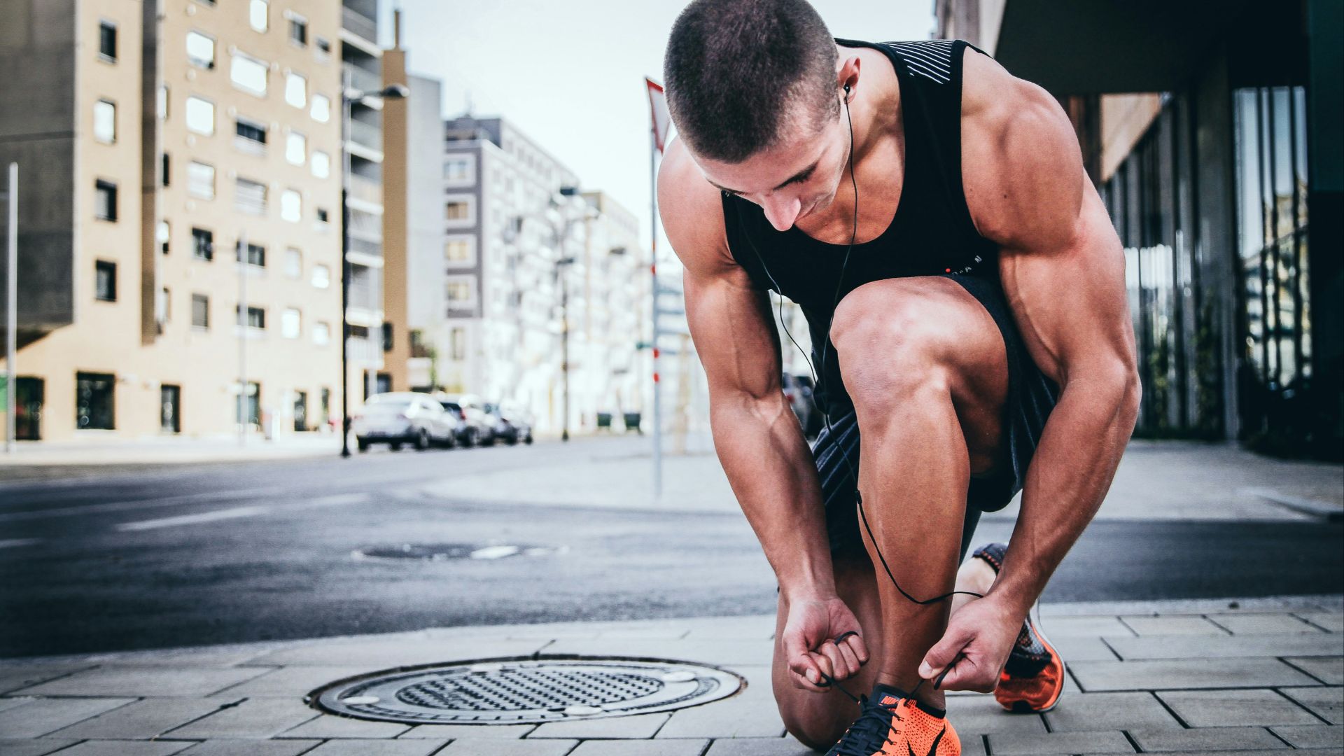 man tying his shoes