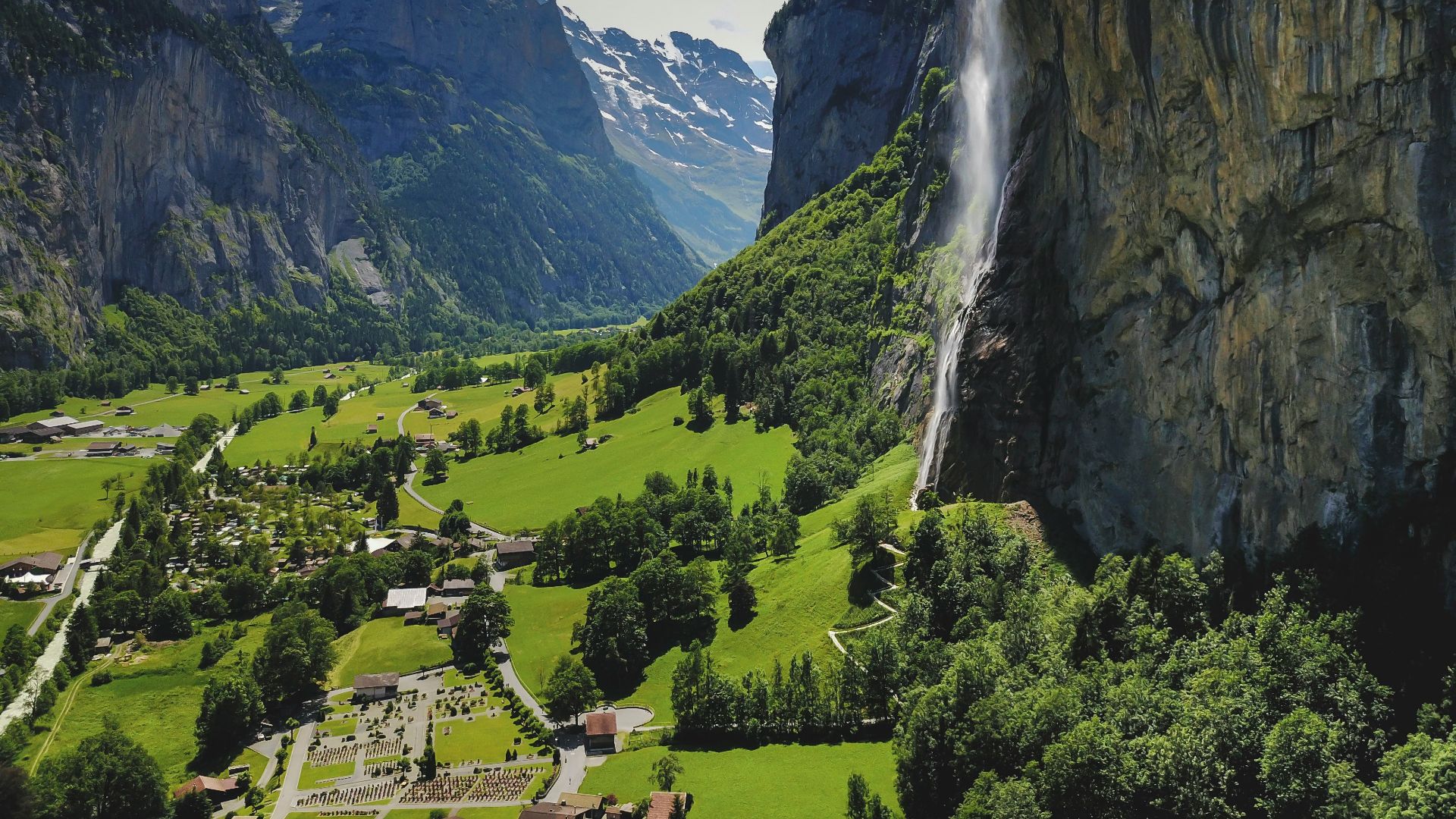 waterfalls beside grassland