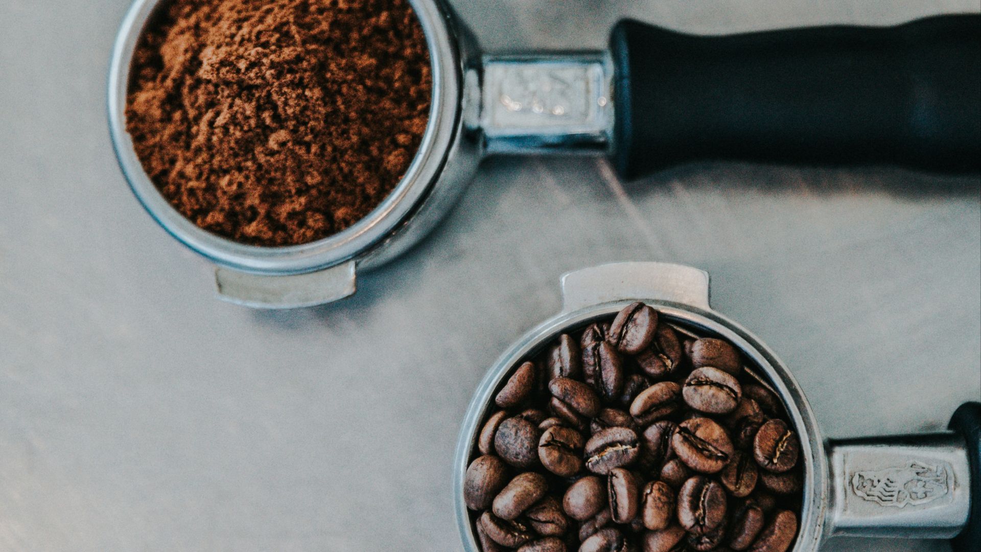 flat lay photography of coffee latte, ground coffee, and coffee beans