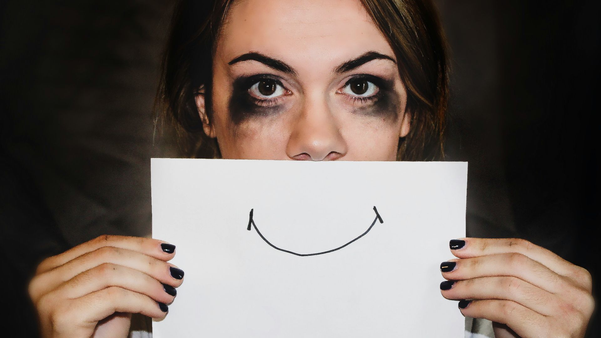 person holding white printer paper