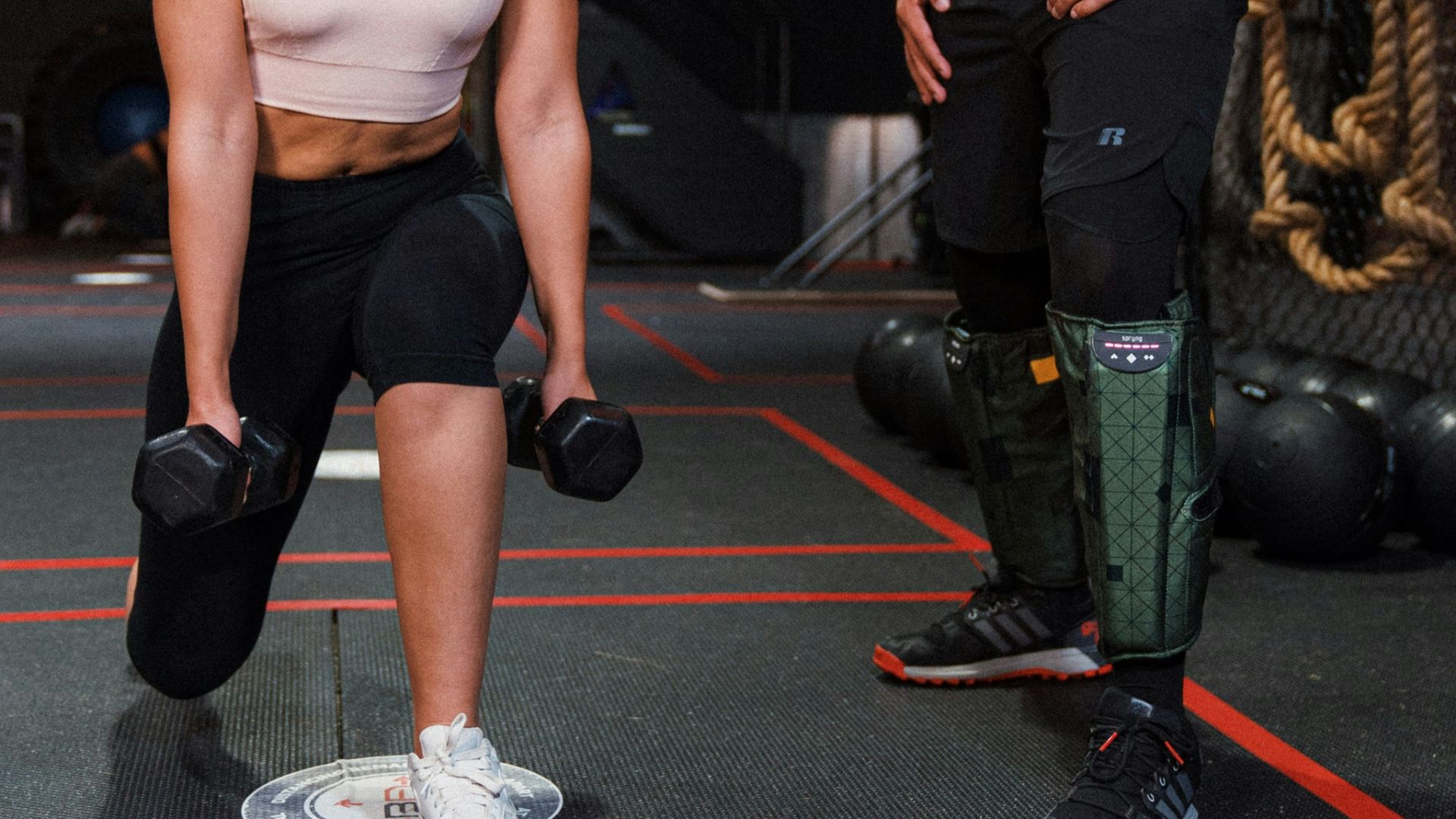 a man and a woman in a gym