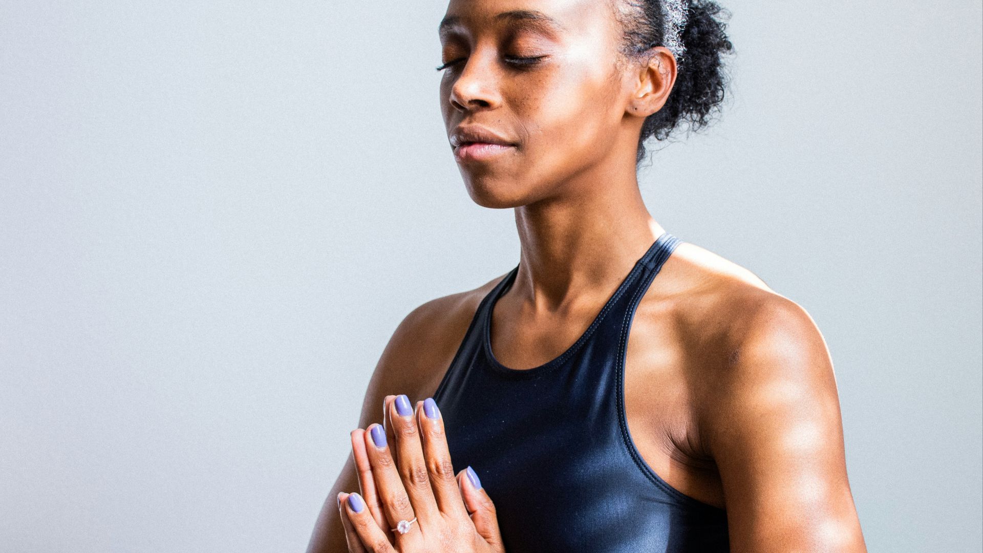 woman wearing black sports bra