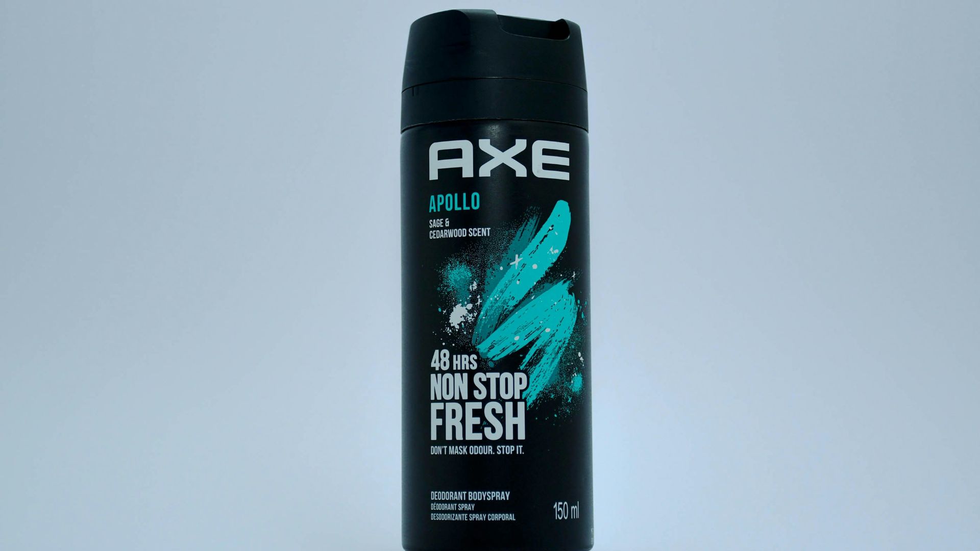 A bottle of axe men's fresh deodorant on a white background