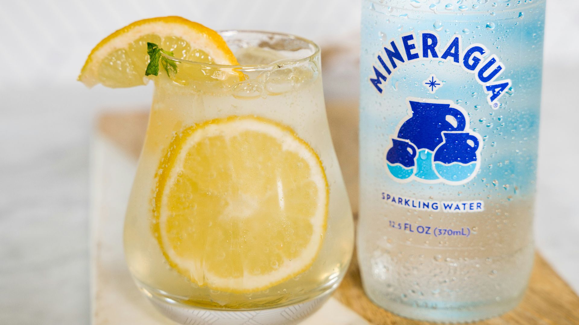 clear glass bottle with lemon juice